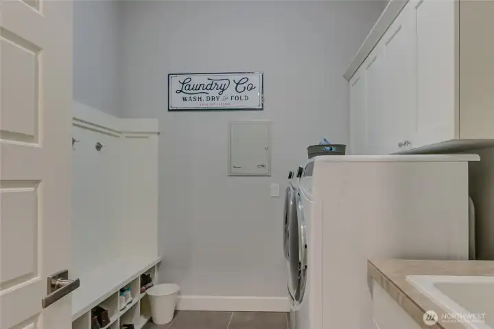 Main floor utility with storage