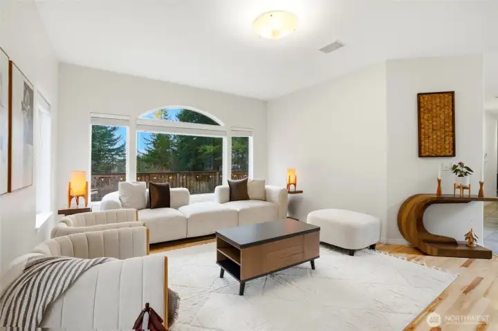 The open layout makes this an ideal setting for both quiet relaxation and effortless entertaining. A refined yet comfortable space designed for everyday living and special gatherings alike.