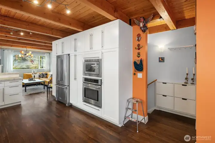 Exposed wood ceilings continue onto the 2nd floor