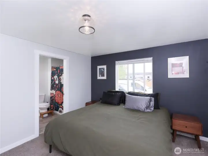 Primary bedroom with full bath