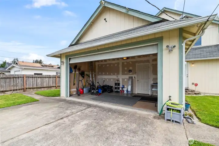 Garage door still operates, used for storage.