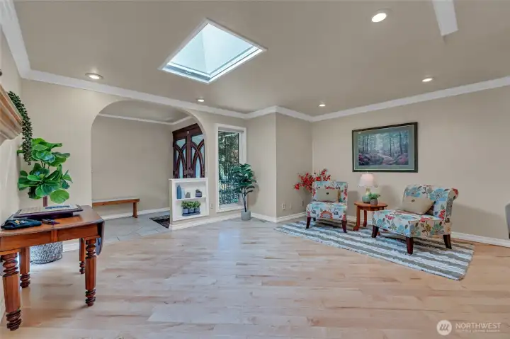 Hardwood floors in the kitchen/second living room have recently been re-done. Lovely crown molding.