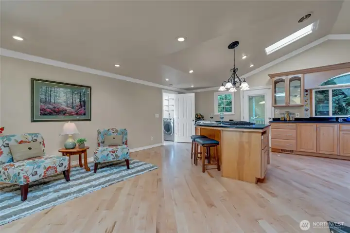Skylights can stay open or be closed. Laundry room leads out to the garage. High ceilings.