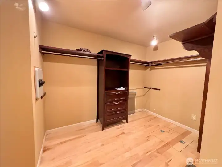 Walk-in closet with safe.