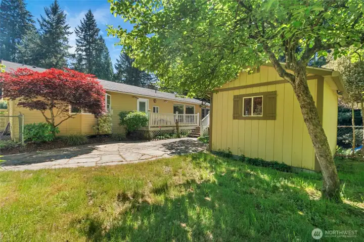 Patio and good sized shed for storage in the back yard.