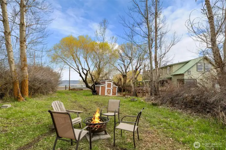 Nothing beats a cozy firepit by the creek—perfect for roasting marshmallows and stargazing under the night sky.