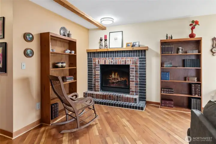 This is definitely the spot to relax—cozy up with your favorite book or sip coffee by the gas fireplace featuring a beautiful mantel, hearth, and blower.