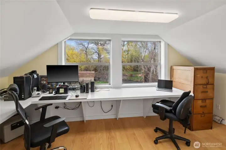 How would you love to have an office with a stunning view of the Stuart Mountains and Coleman Creek? Wait no more—this dream workspace is ready for you!