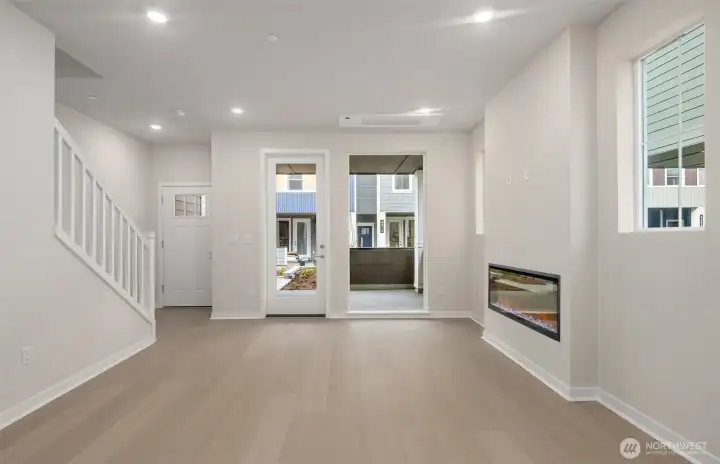 Gather room and front entry. Similar home shown. Gather room and front entry. Similar home shown.