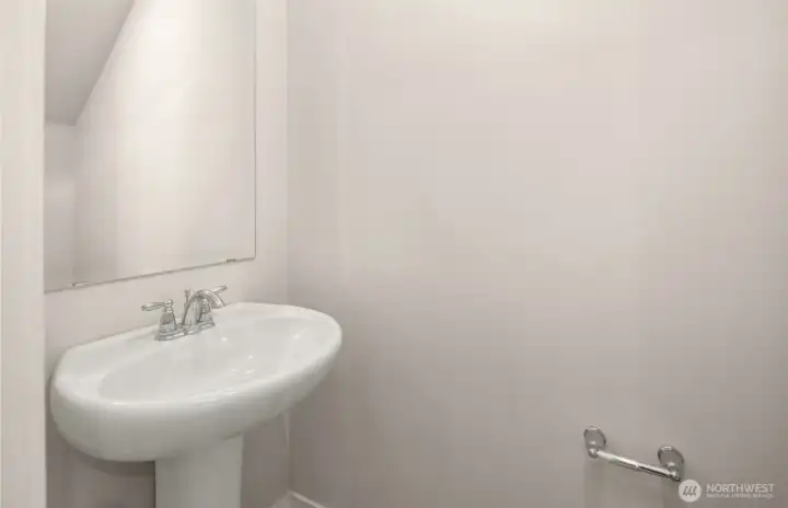 Main floor powder bath. Similar home shown. Main floor powder bath. Similar home shown.