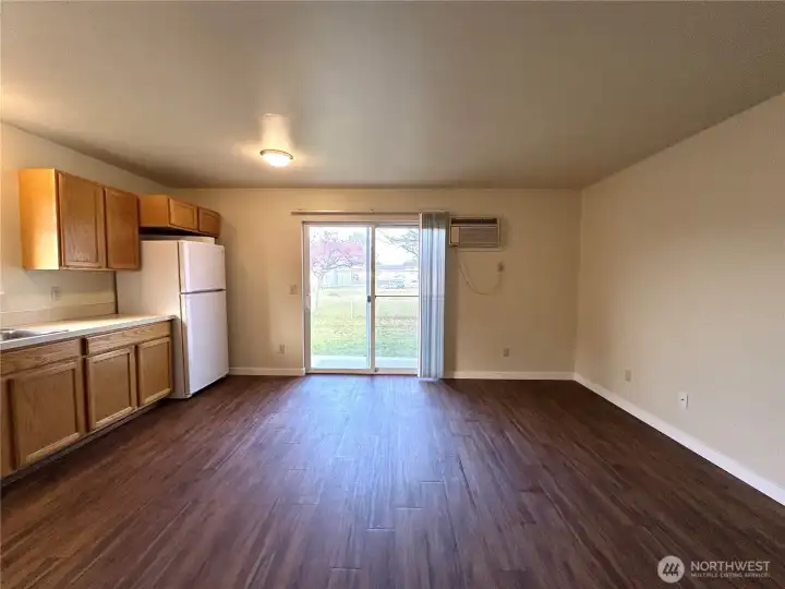Kitchen and dining area leading to backyard patio