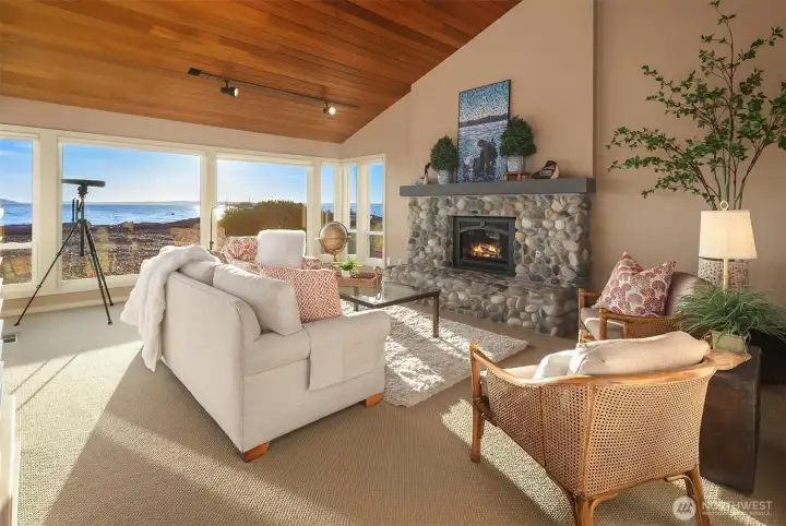 The Living room features a river rock propane fireplace and vaulted wood ceiling. The Living room features a river rock propane fireplace and vaulted wood ceiling.