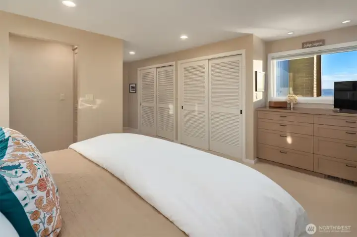 Ample closet space, waterfront window, and ensuite bathroom. Ample closet space, waterfront window, and ensuite bathroom.
