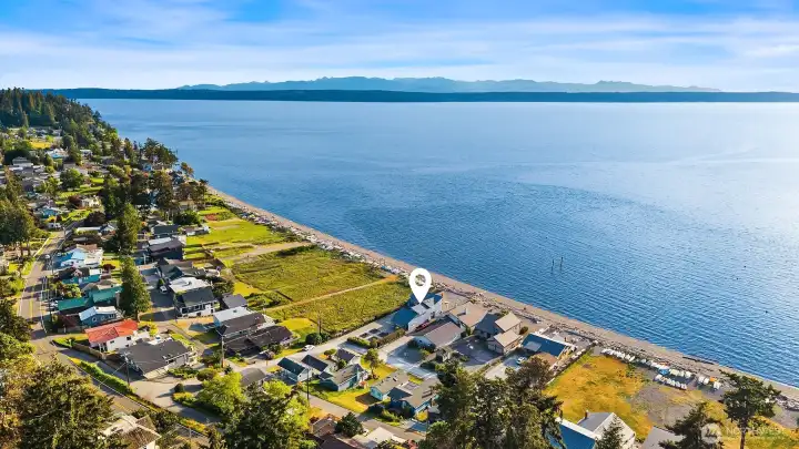West facing walk out waterfront with privacy, garden beds, and ample parking. West facing walk out waterfront with privacy, garden beds, and ample parking.