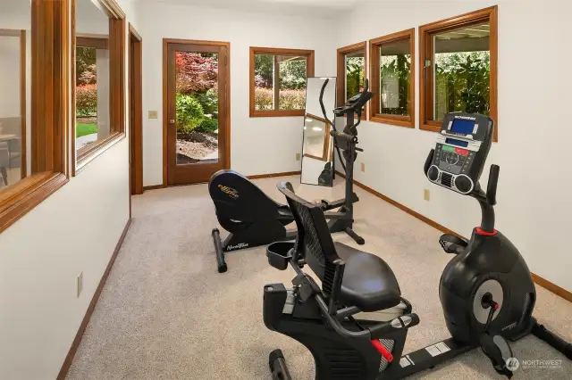 This space was originally used by the owner as a home office.  You may choose to use it the same way, or perhaps you could make it your own home gym?