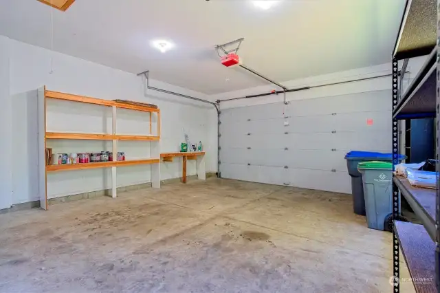 Some storage shelves in good sized garage