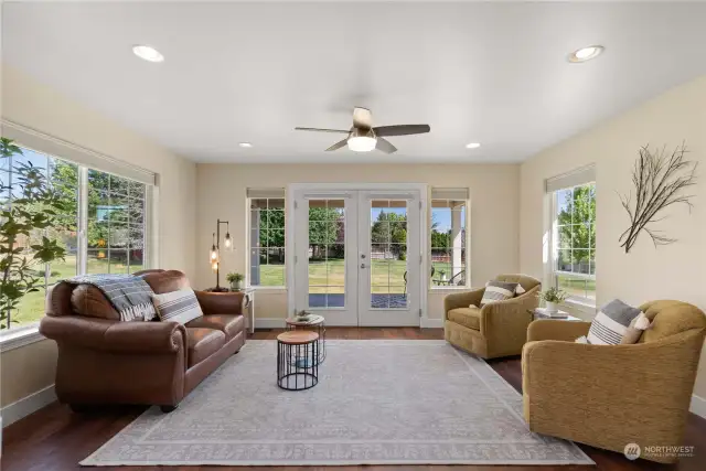 Another living room with french doors to the back patio.