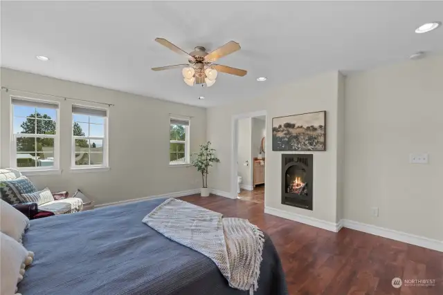 Gas fireplace & beautiful flooring.