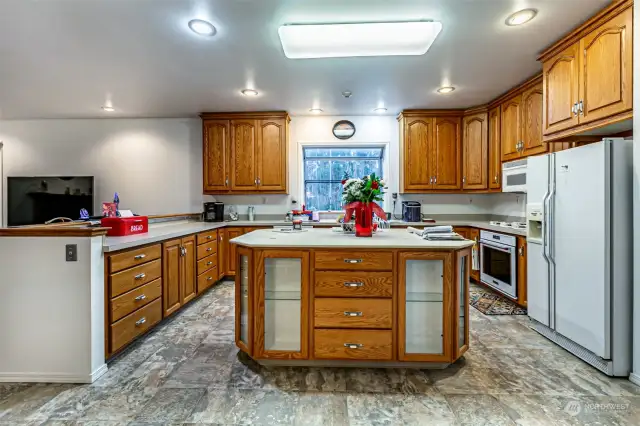 Huge kitchen with oversized lighted island