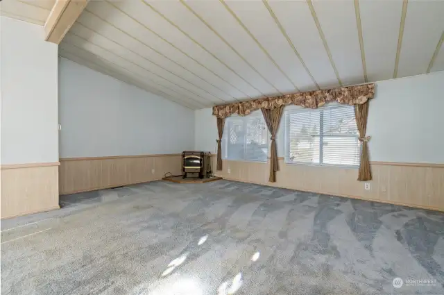 Living room from front door with vaulted ceiling