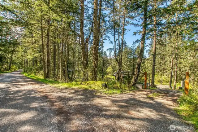 Main entry gate into the property. A second access gate is also located off Blue Heron Lane, closer to the tiny house.