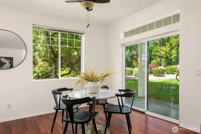 The dining room overlooks the common yard. The slider offers easy access to the patio.