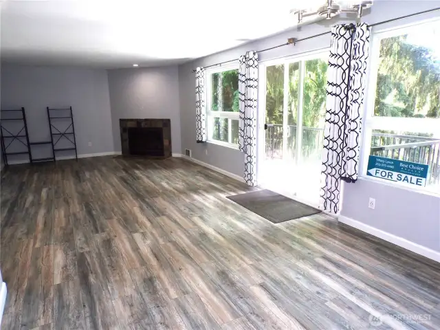 nice fireplace and slider to deck