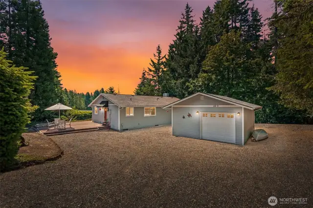 Plenty of driveway parking + an oversized 1 car garage with space for a workshop or golf cart. Faux twilight lighting.