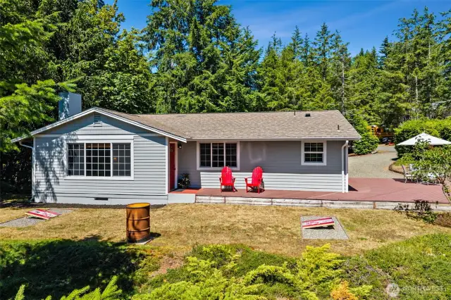 Enjoy your favorite yard games, or meals on the wrap around composite deck.