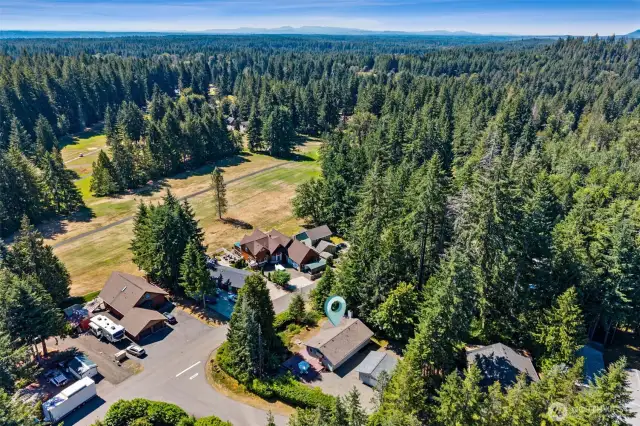 Located near the 3rd fairway on an oversized corner lot!