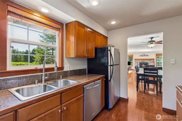 Hardwood floors, updated cabinets, and recessed lighting.