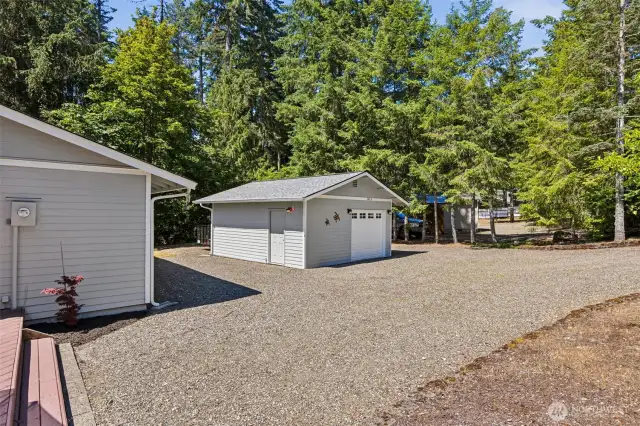 Plenty of off street parking. The oversized 1-car garage has a newer roof and both garage and house have cement board siding.