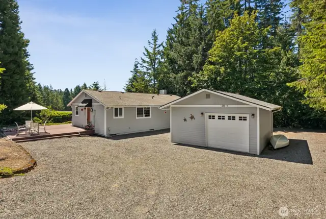 Plenty of driveway parking + an oversized 1 car garage with space for a workshop or golf cart.