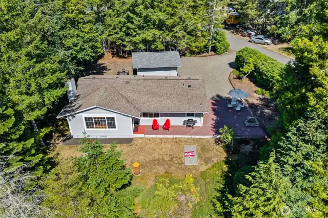 Aerial view of home and garage.