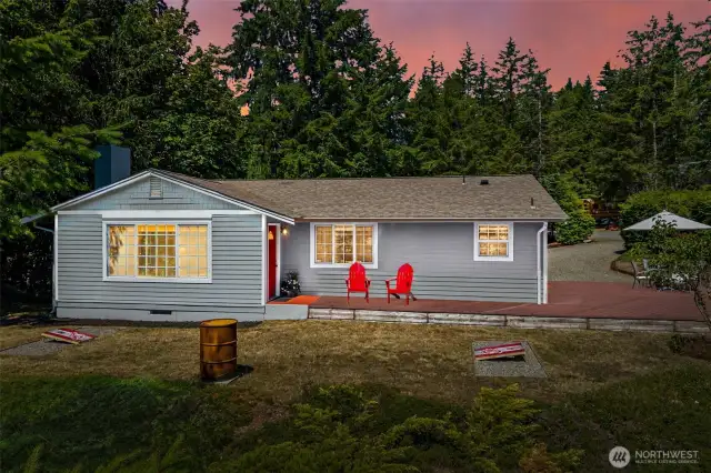 Faux twilight showing front side of home.