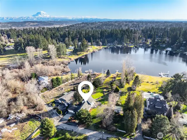.56 Acre park-like setting  Mature cultivated landscaping / border gardens / planting beds  Sprinkler system
