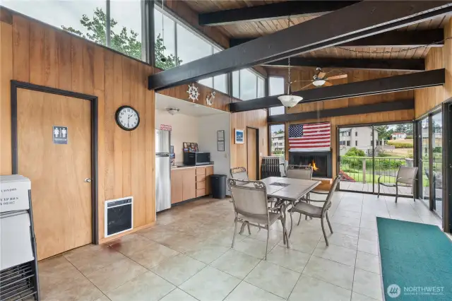 Here's an inside look at the clubhouse with kitchen and fireplace.