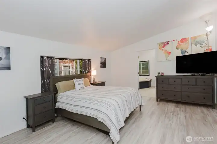 Primary suite with walk in closet and 5 pc bath