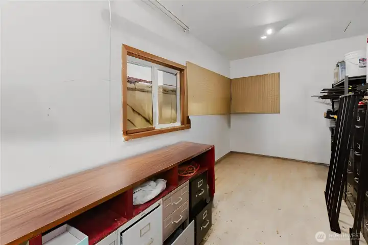 10x23 Insulated Shop just off the attached 2 car garage.