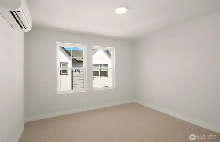 Second bedroom w/ ensuite bathroom - similar unit