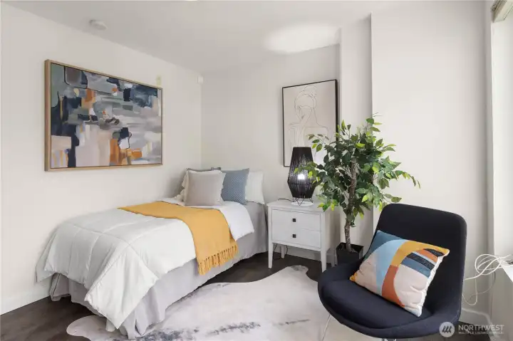 Downstairs bedroom, studio, or office.