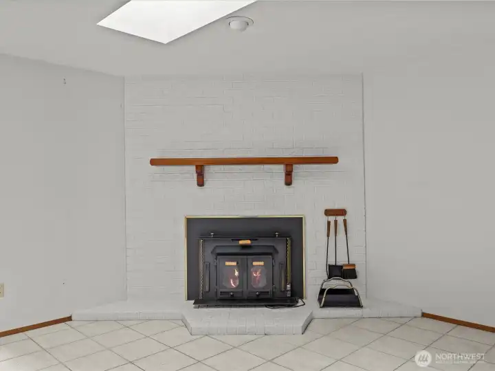 Wood stove and you wont need to purchase wood, you will live in the woods