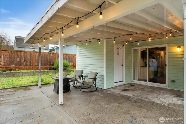 Covered back patio w/ additional storage