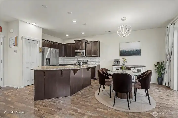 View of your kitchen from the family room, great for gathering and entertaining! ***Virtually Staged***