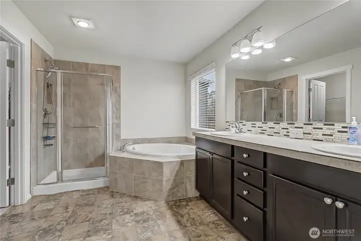 True 5-piece Primary ensuite bath, love the soaking tub, double vanity and ALL that counter space!