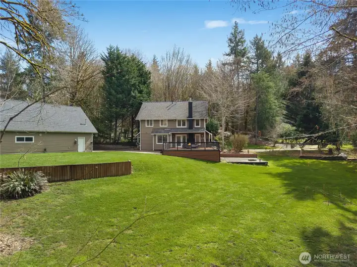 Expansive yard provides plenty of room for recreation, gatherings, or future uses.