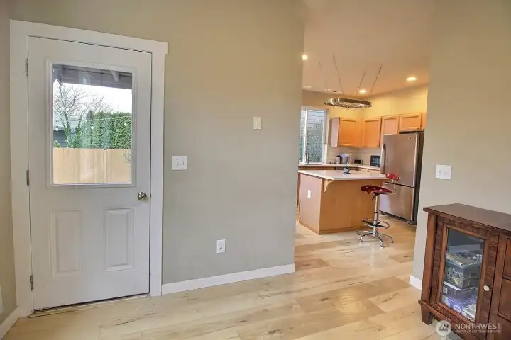 Extra space off kitchen, office, play or storage. Door to the backyard & detached garage.