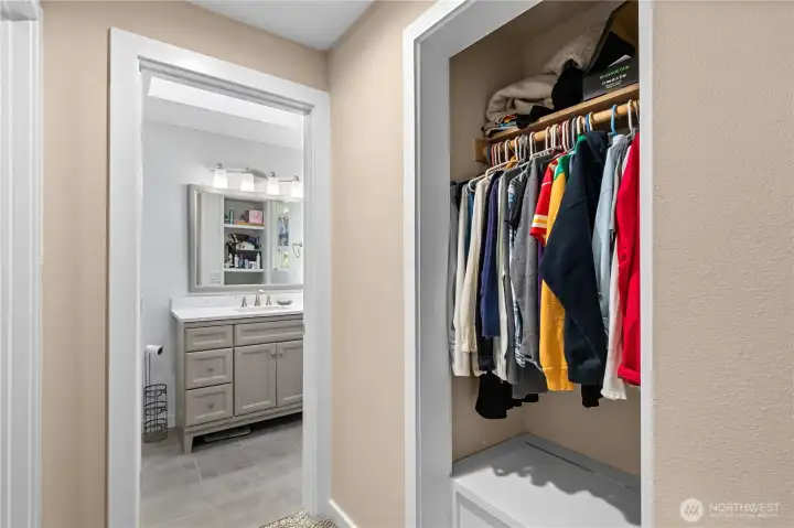 To the Master Bath.  This is one half of the Hers & Hers closet.