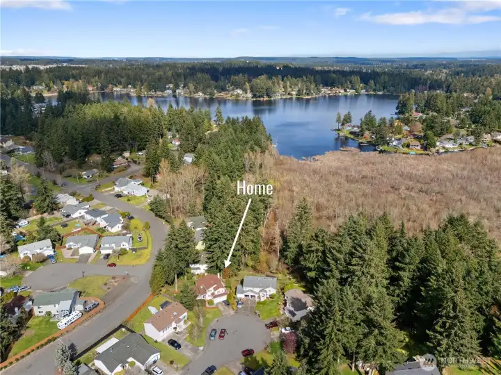 The home is close to Long Lake, westside.  Community park is in the upper left corner.  Trail to the school is below.