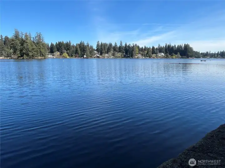 Long Lake view from the shoreline benches of the Meadowlake Community park.  Community maintained.